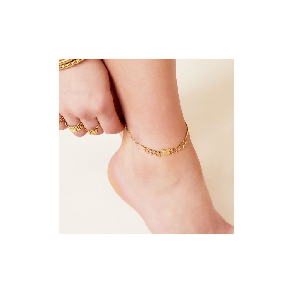 Cavigliera in acciaio con farfalle pendenti bagnata in oro