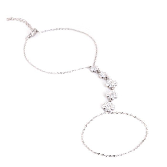 Baciamano in acciaio donna con quadrifogli zirconati