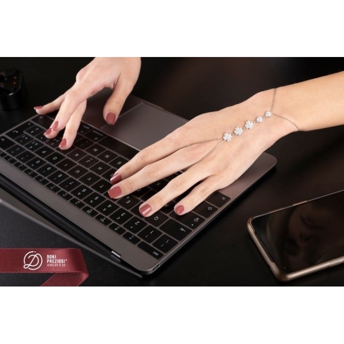 Baciamano in acciaio donna con quadrifogli zirconati