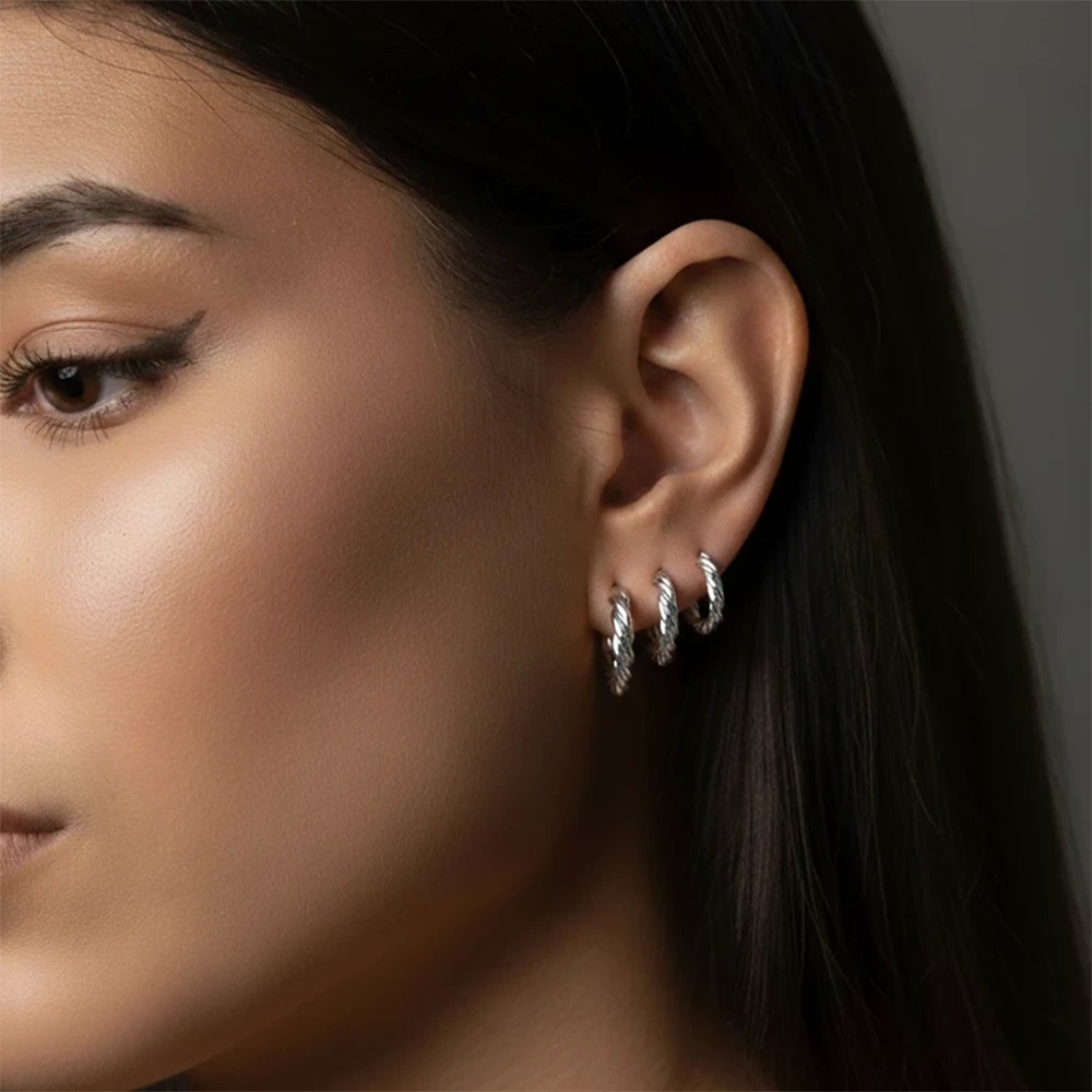 Set Orecchini cerchio intrecciati placcato oro