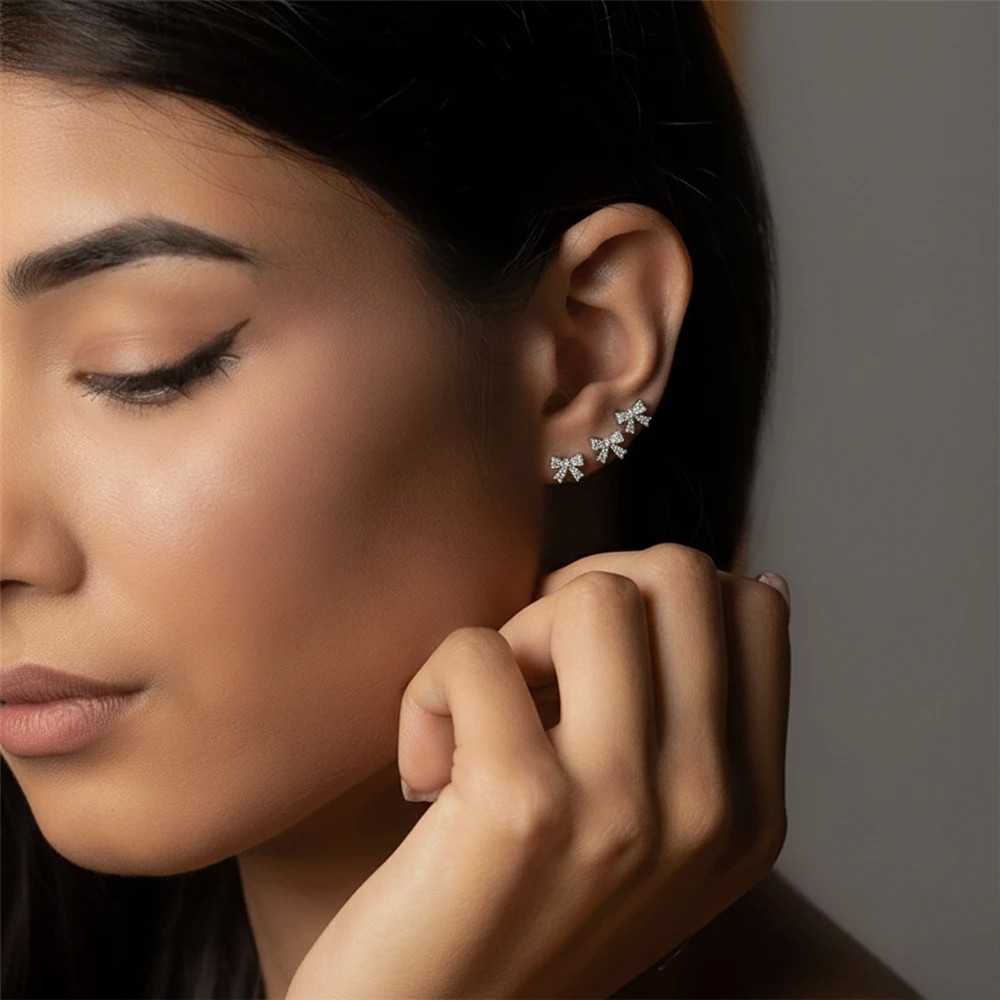 Set Orecchini fiocco pavè