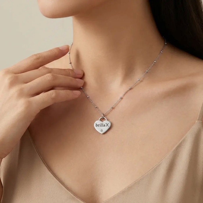 Collana personalizzabile cuore bicolore con punto luce