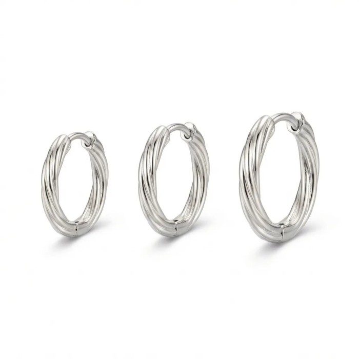 Set Orecchini cerchio intrecciati placcato oro