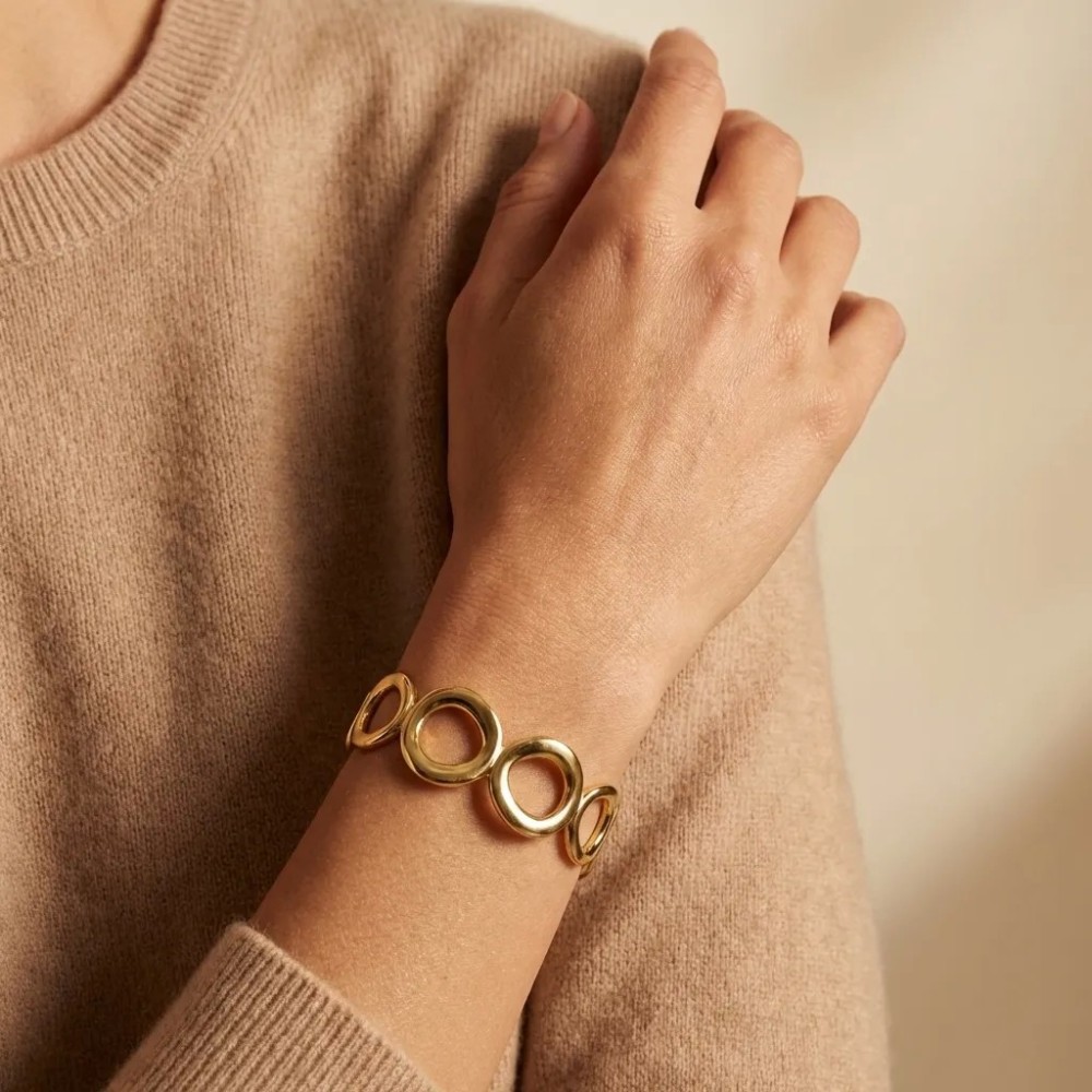 Bracciale Rigido Bolle di Luce | Design a Cerchi Organici in Oro