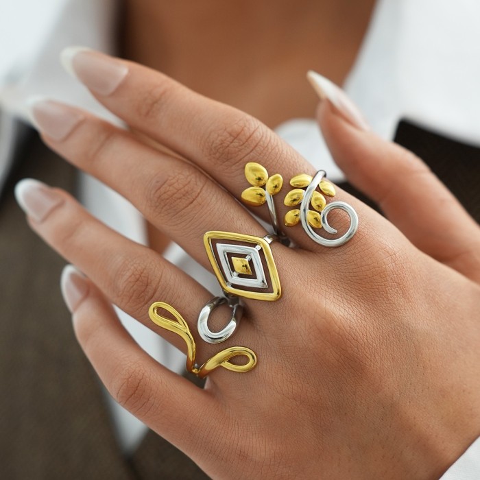 Set Anelli Ethereal Fusion - Design Foglie e Geometrie Bicolore