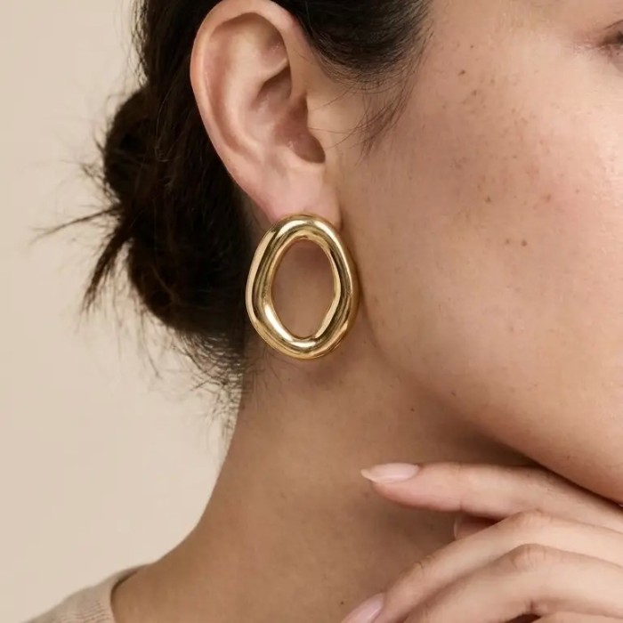 Orecchini Ovali Wavy: Design Organico e Sinuoso | [DoniPreziosi]